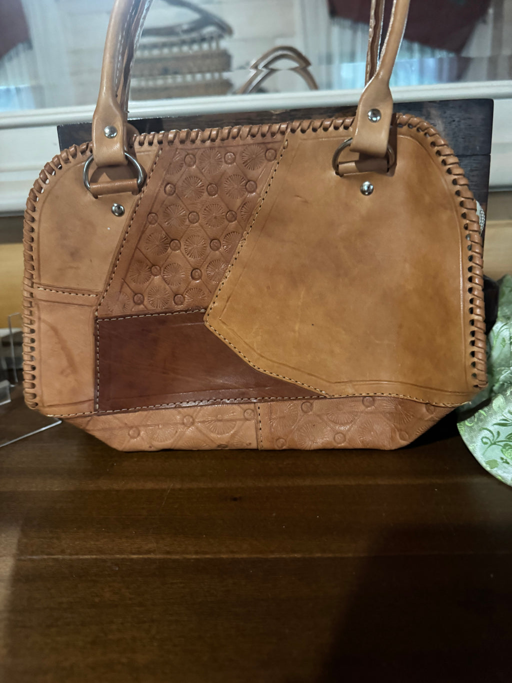 Hand tooled small leather handbag