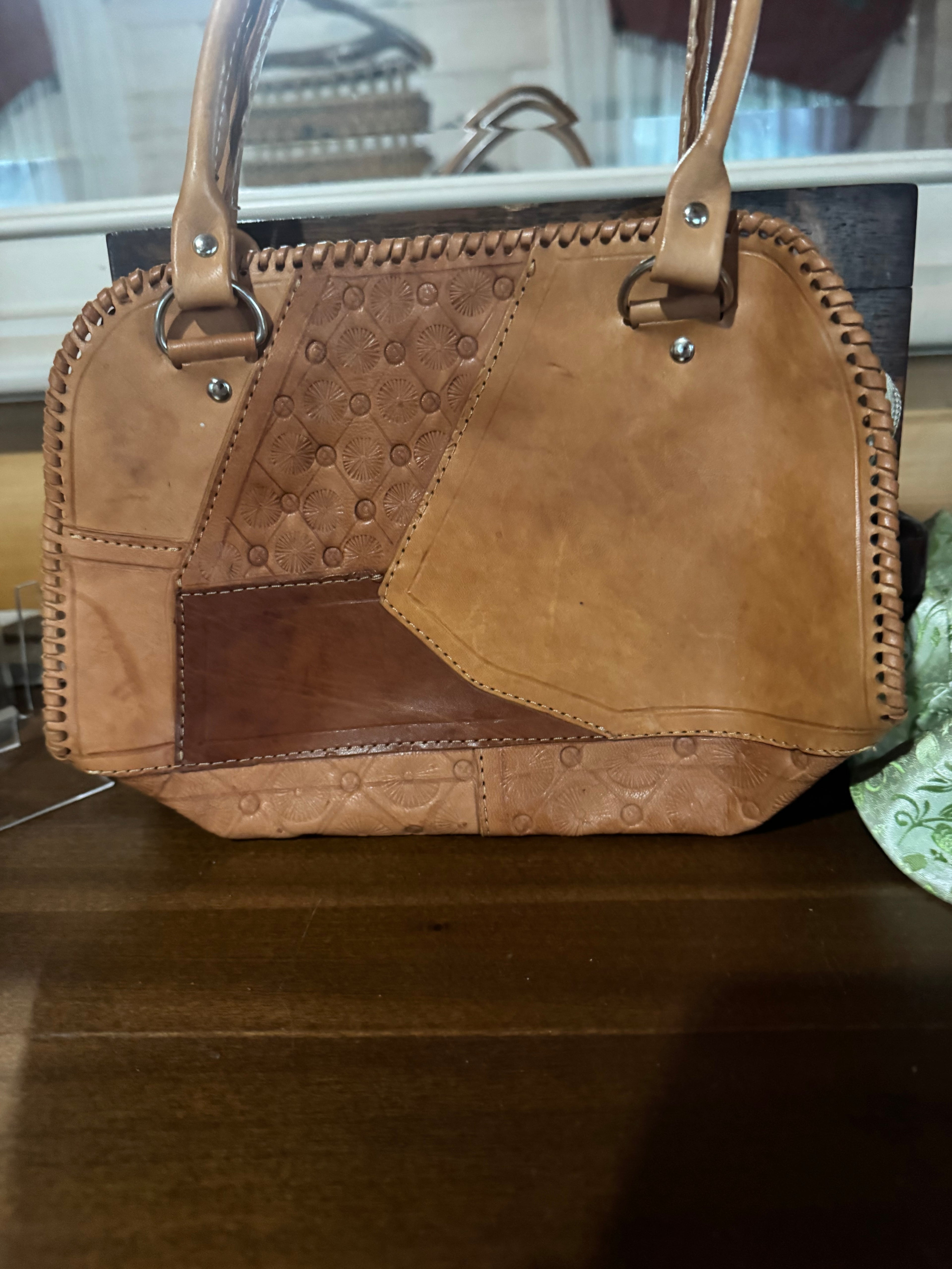 Hand tooled small leather handbag