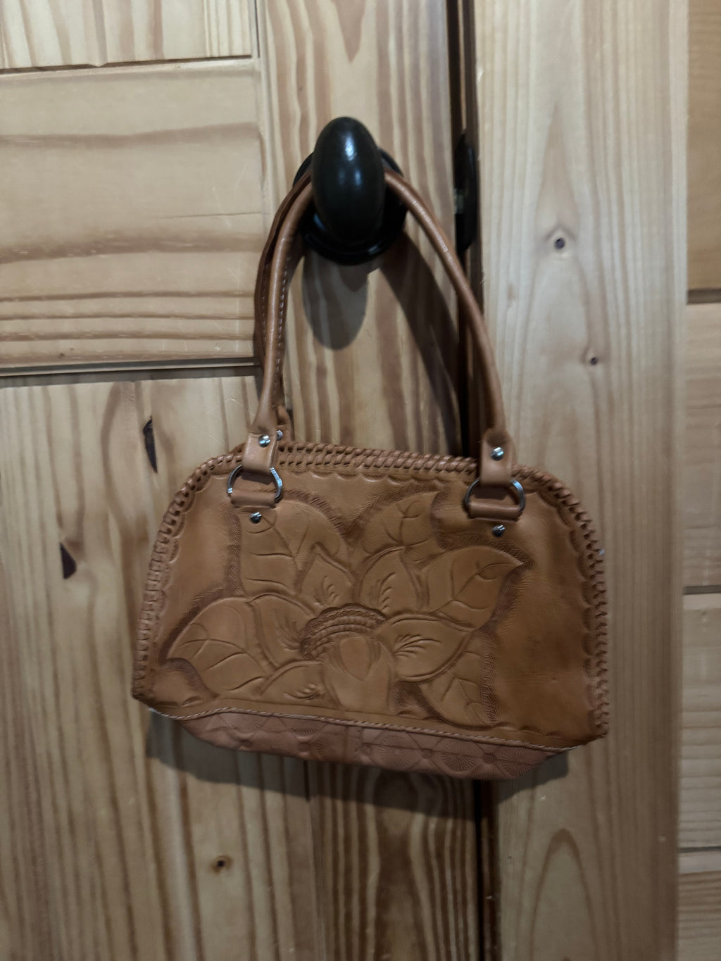 Hand tooled small leather handbag