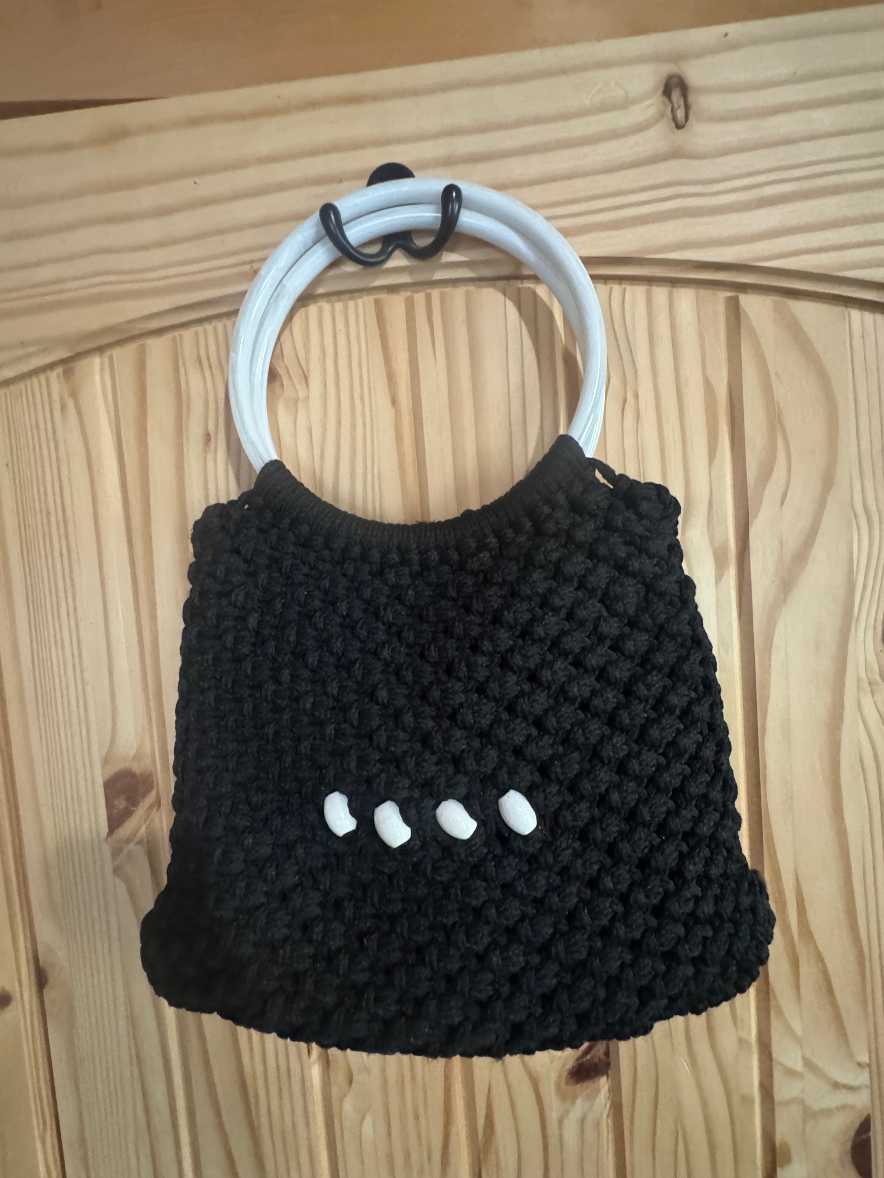 Vacation ready crochet and beaded handbag