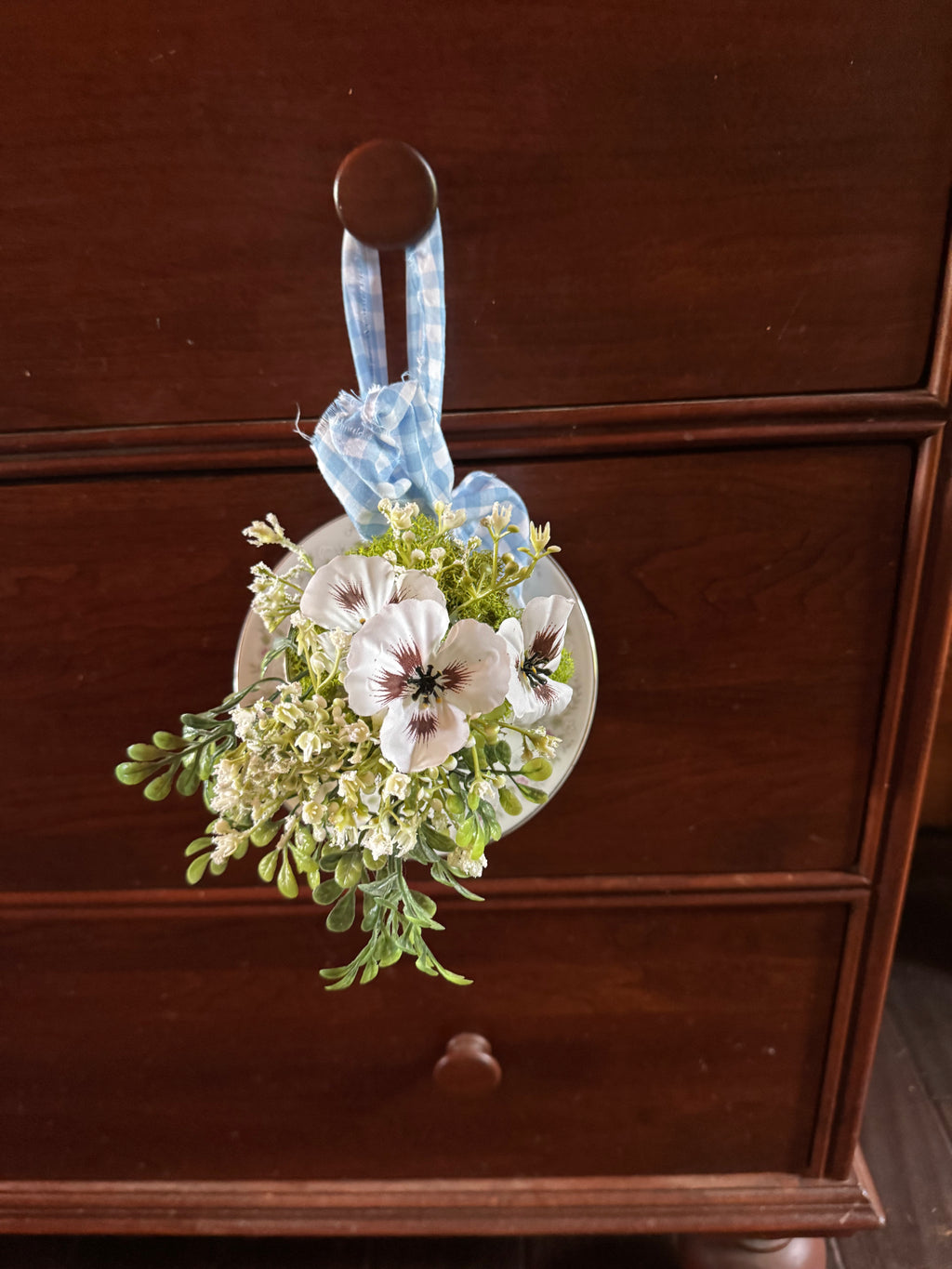 Hanging teacup flower arrangement