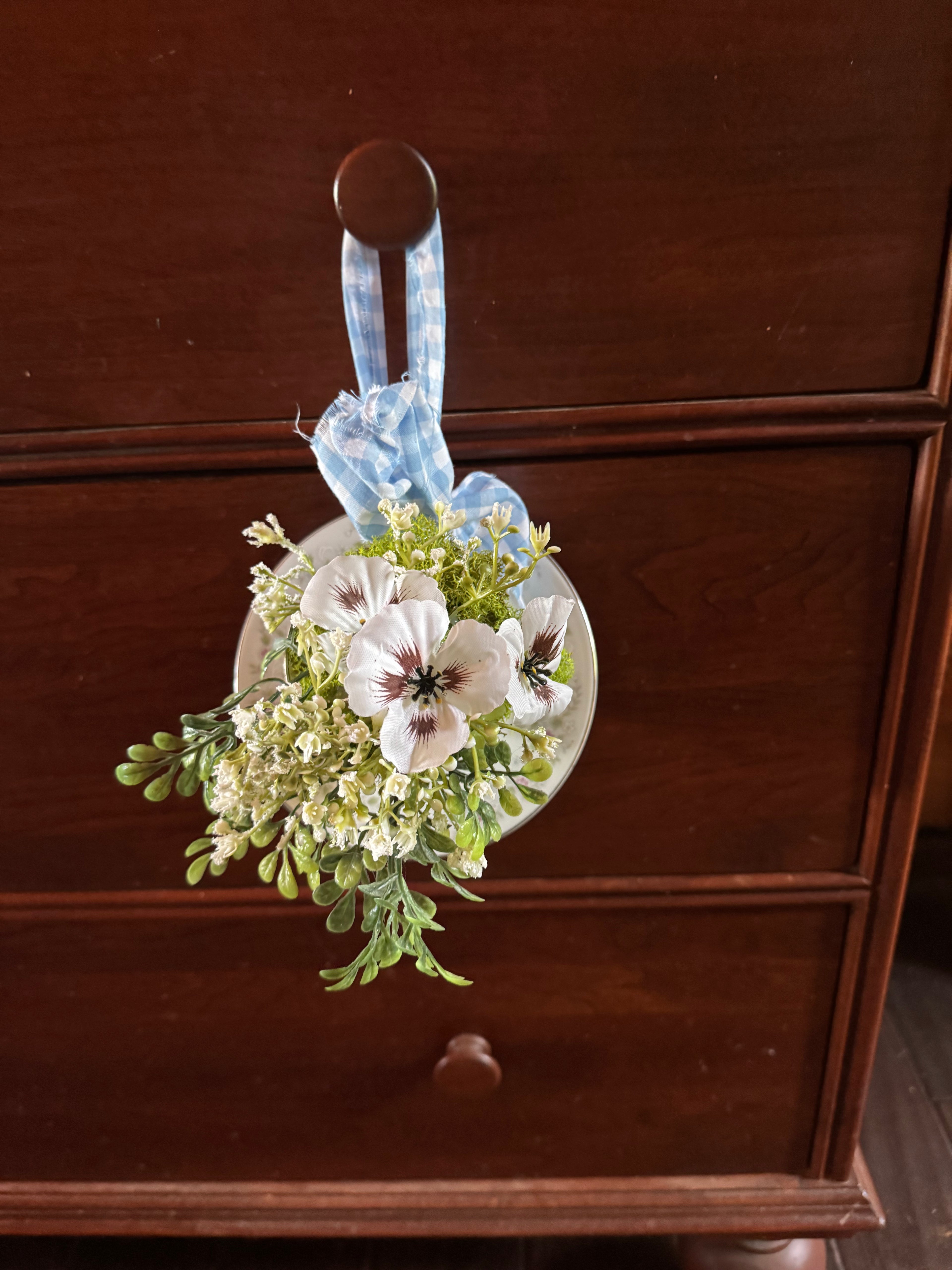 Hanging teacup flower arrangement